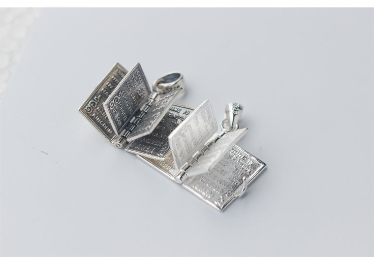 Colgante Biblia en Miniatura de Plata con Apertura Funcional