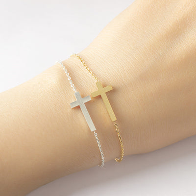 Pulsera cristiana de Cruz Horizontal en Acero Inoxidable y Baño de Oro