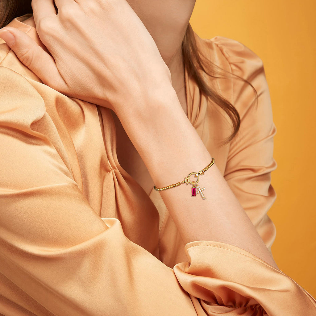 Pulsera cristiana con cruz y piedra