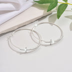 Pendientes rodondos con cruz para mujer