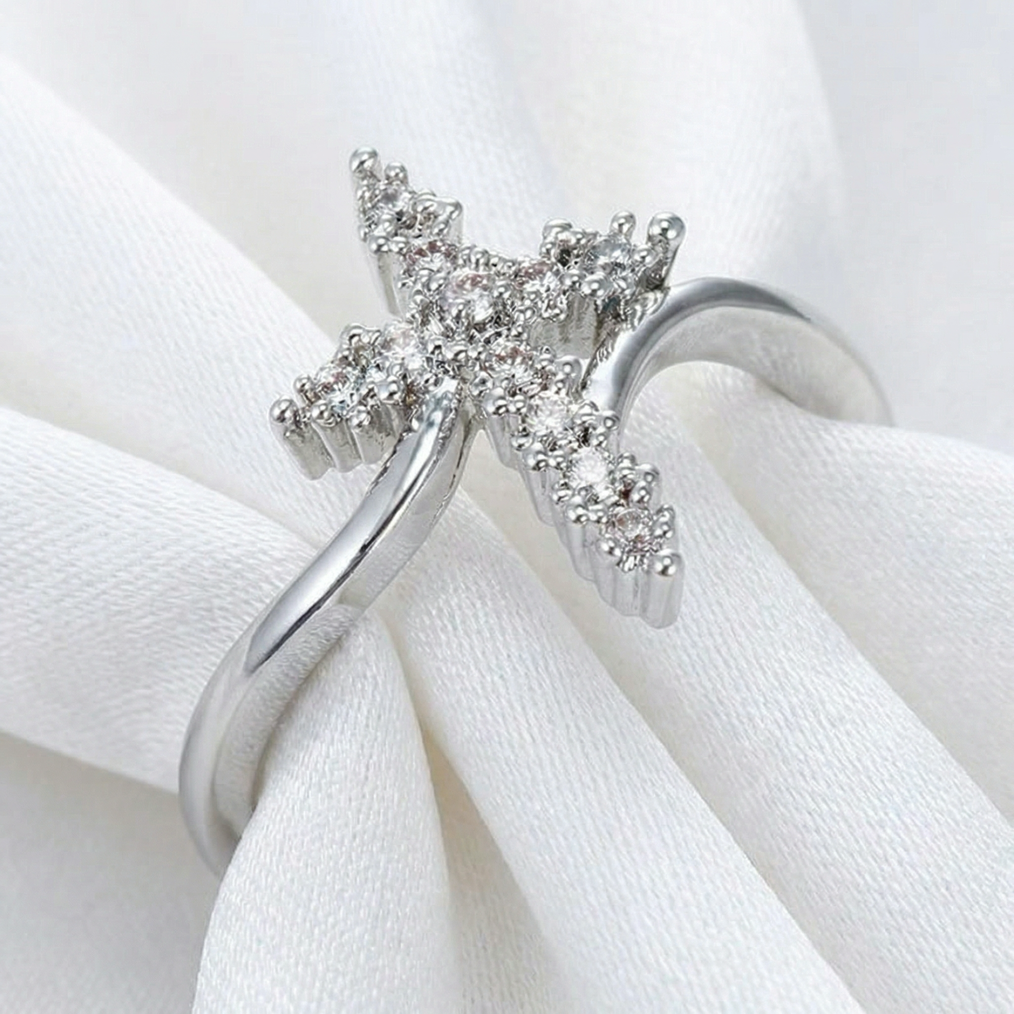 Conjunto Cruz y corona giratoria color PLATA