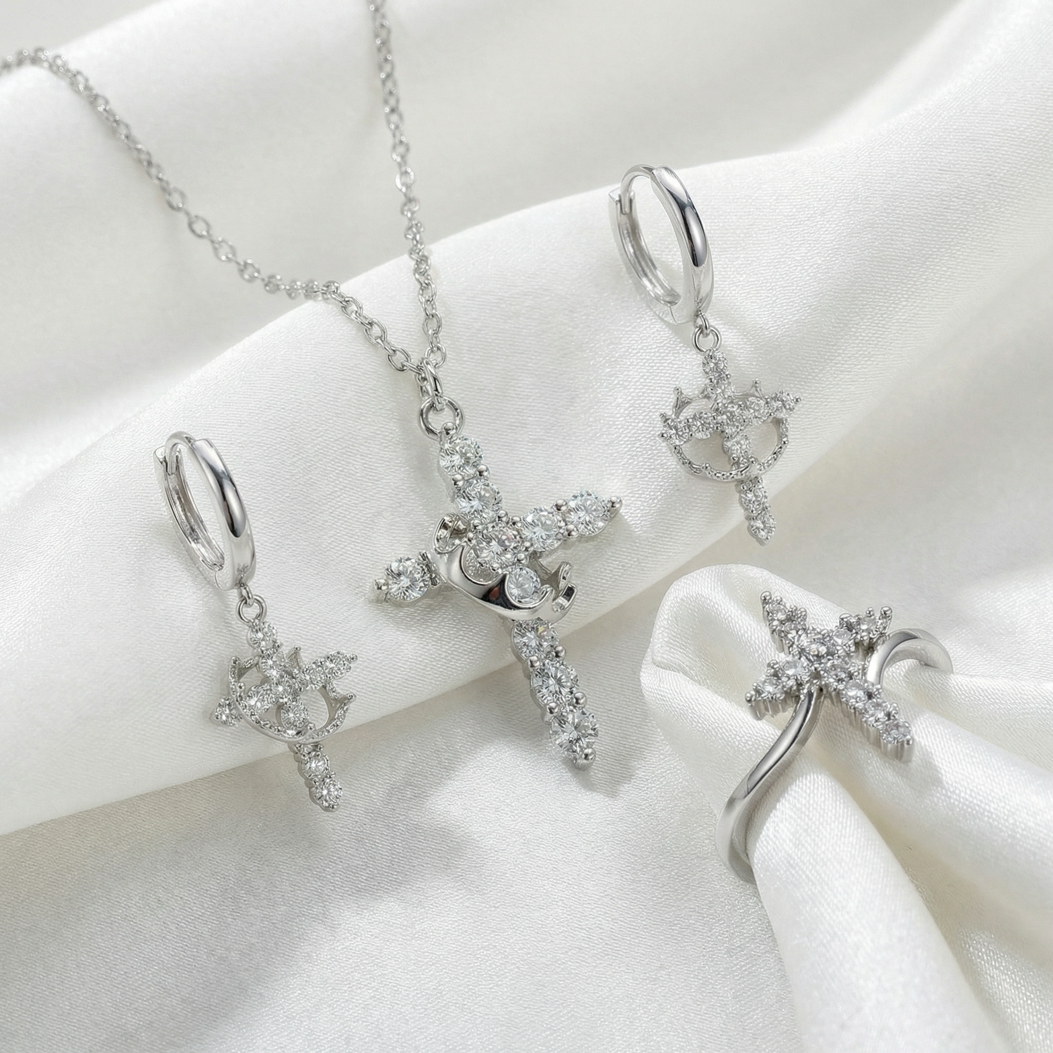 Conjunto Cruz y corona giratoria color PLATA